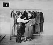 Measuring for a new coat. (photo: Russell Lee)